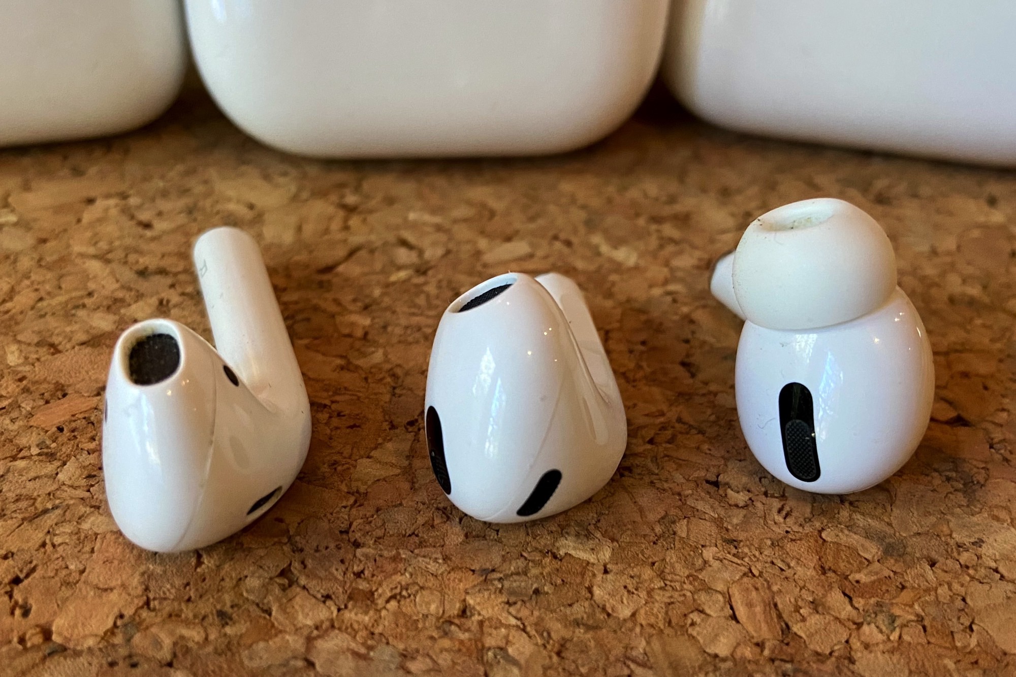 AirPods 3, AirPods, and AirPods Pro side by side.