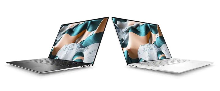 Two Dell XPS 15 Touch Laptops sit back to back.