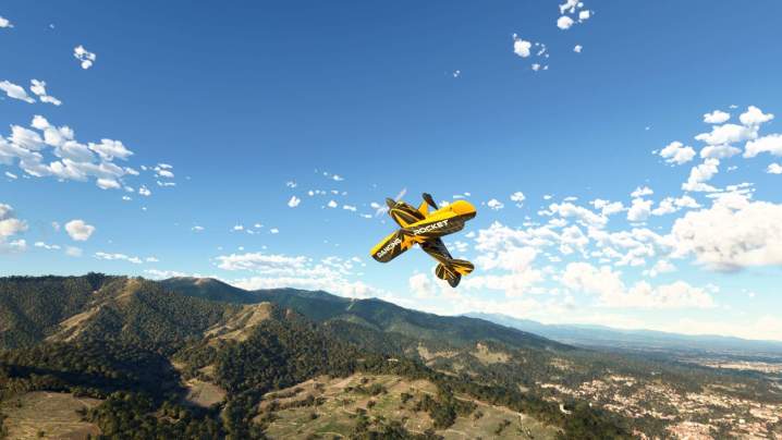 A plane turns upside down in Microsoft Flight Simulator.