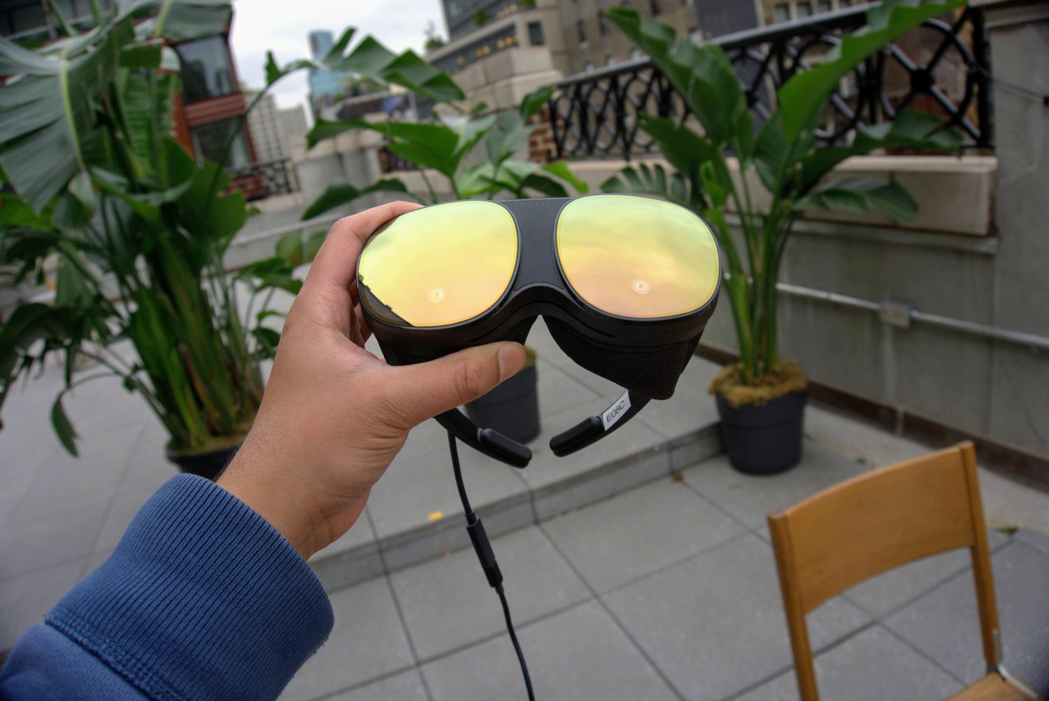 HTC Vive Flow reflective goggles.