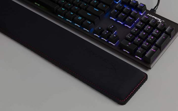 Take off the HyperX wrist rest next to the keyboard.