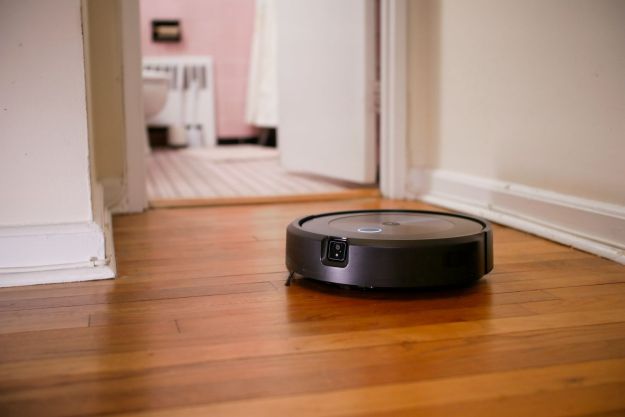 iRobot Roomba j7+ on hardwood floor.