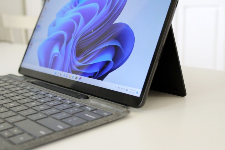 The Type Cover and Surface Slim Pen 2 attached to the Surface Pro 8.