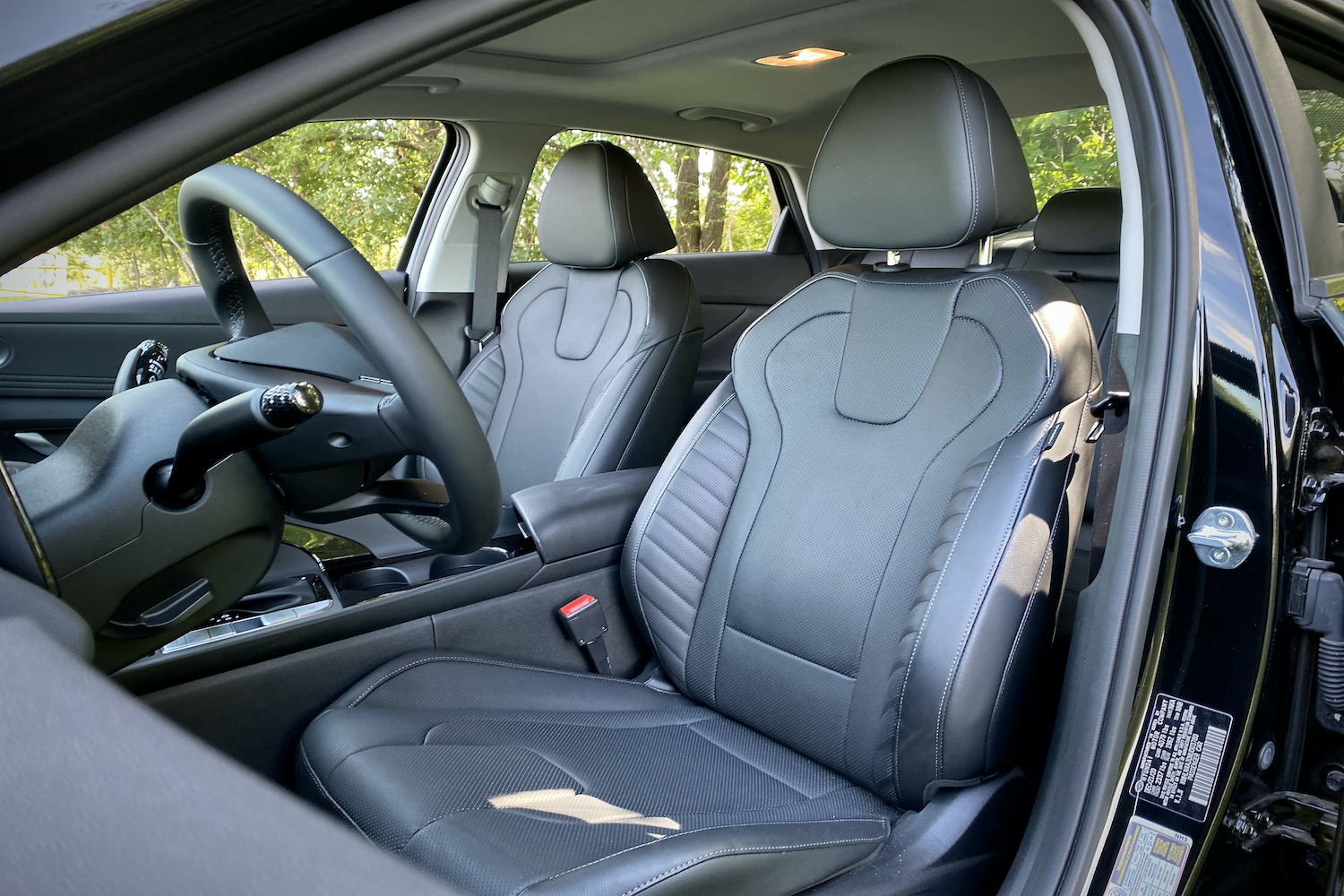 Driver's seat in the 2021 Hyundai Elantra Hybrid from the front.