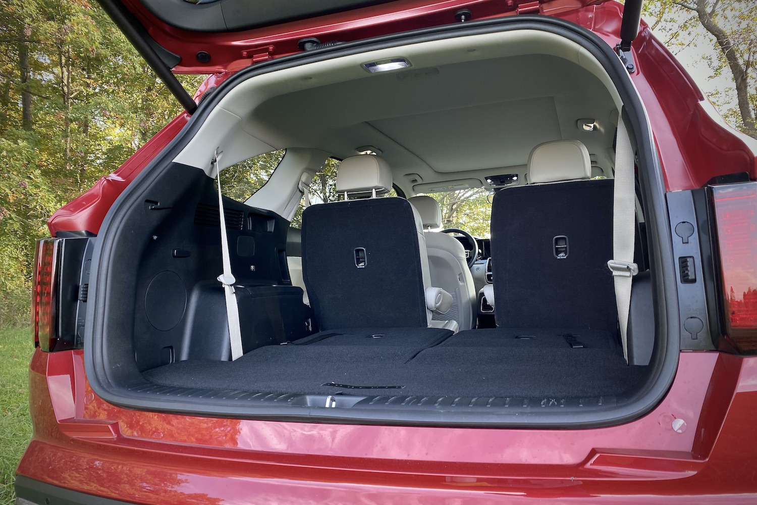 Cargo area of the 2021 Kia Sorento Hybrid with the third row of seats folded.