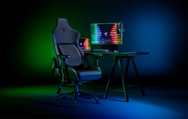 Razer gaming chair in front of a desk with a computer.