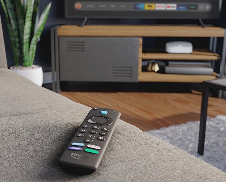 Amazon Fire TV Stick 4K on a couch.