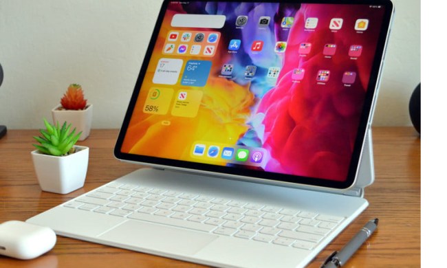 A 2021 iPad Pro is attached to a keyboard on a desk.