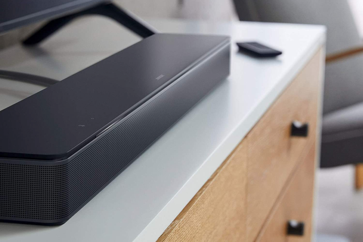 Bose Bluetooth soundbar next to a TV.