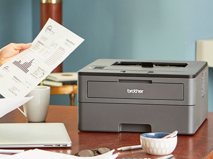 Brother HL-L2325DW Monochrome Laser Printer on a desk.