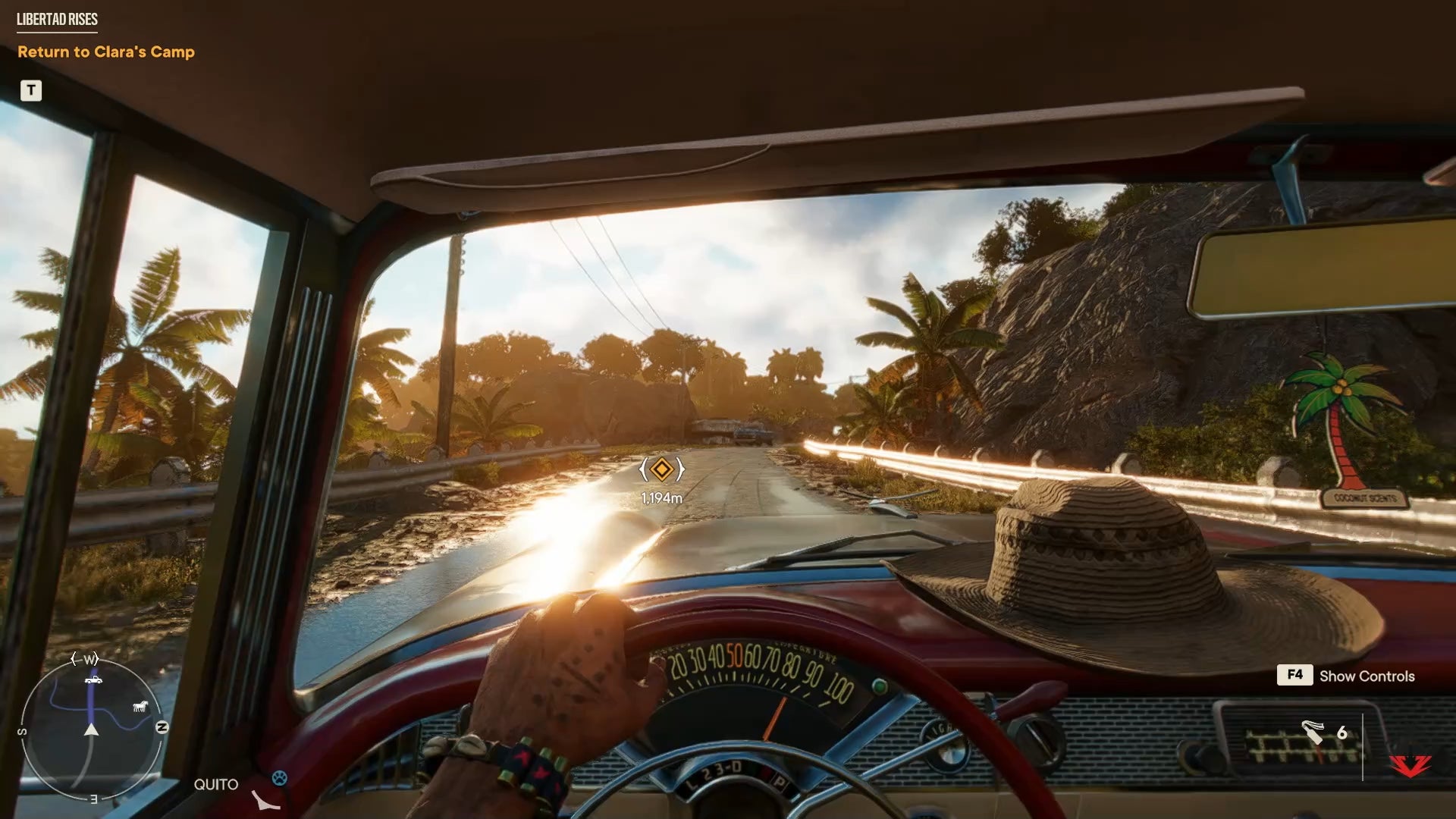 Far Cry 6 dirigindo um veículo.
