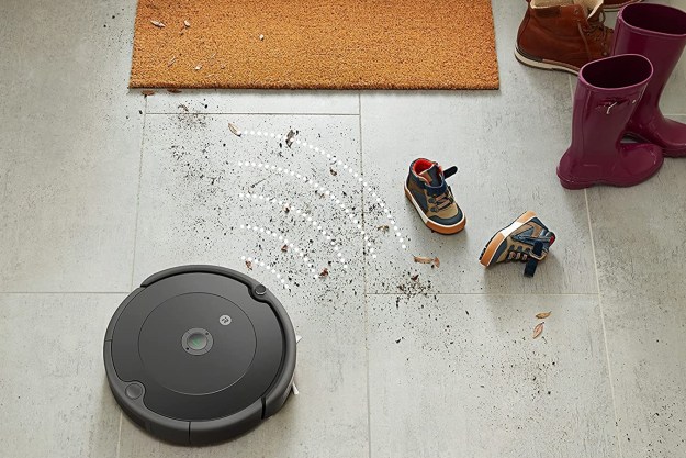 iRobot Roomba 694 Robot Vacuum cleaning a foyer.