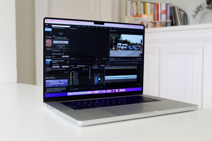 The MacBook Pro running an Adobe Premiere Pro benchmark.