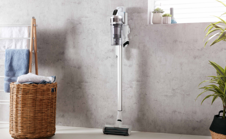 Samsung Jet 60 cordless vacuum cleaner stands upright in a bathroom.