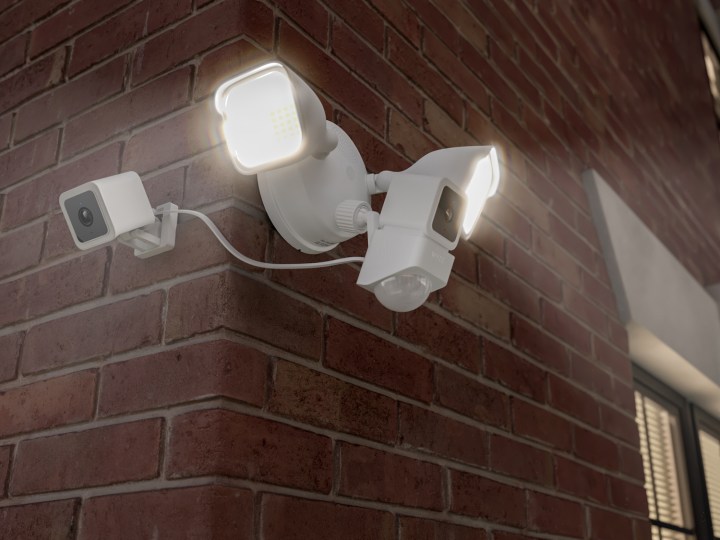 Wyze Cam Floodlight on the corner of a brick house.