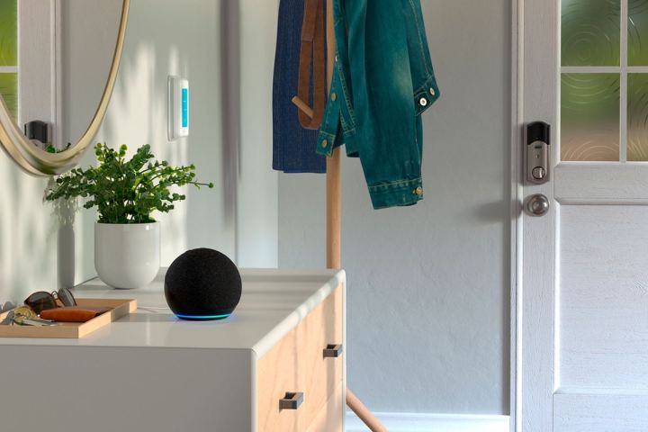 Echo Dot on an entryway table.