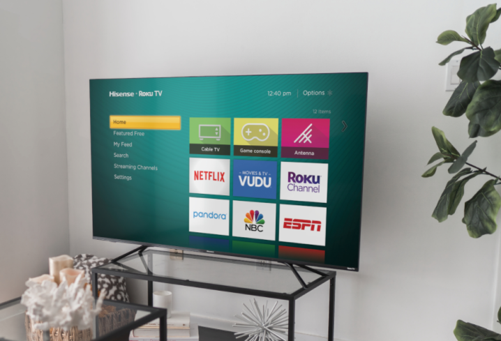 75-inch Hisense A6G 4K TV placed on a TV stand in a living room.
