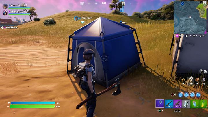 Standing by tent in Fortnite.