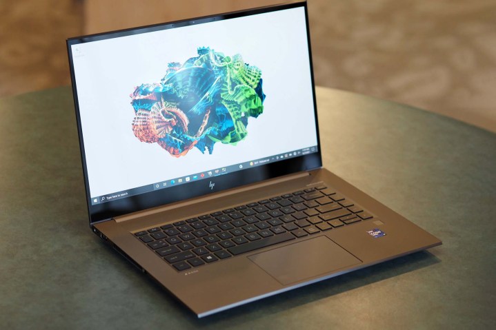 A HP ZBook Studio G8 sits on a table.