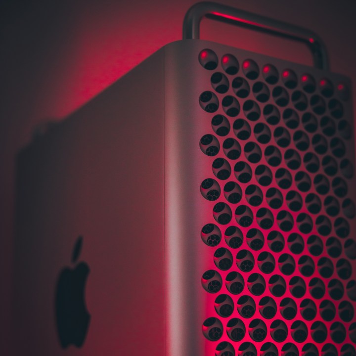 The 2019 Apple Mac Pro is set against a dark red background.