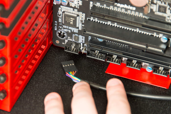 Attaching front panel USB connectors to a motherboard.