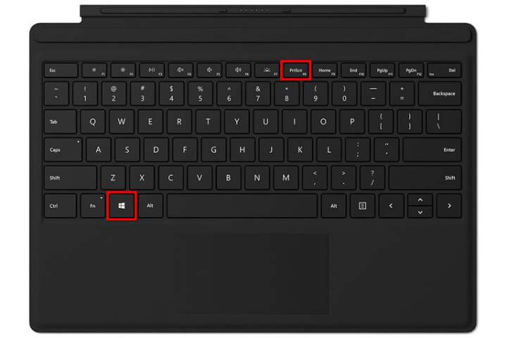 Uma capa tipo Surface Pro 7 com duas teclas destacadas.