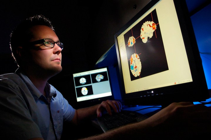 An fMRI scan being observed by a