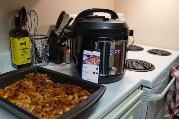 Instant Pot Pro Plus with casserole dish in foreground.