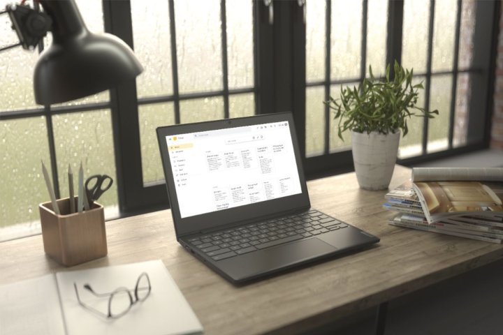 A Lenovo Chromebook 3 sits on a desk. 
