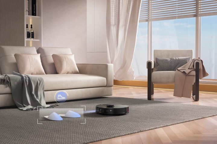 The Roborock S7 MaxV cleaning a living room.