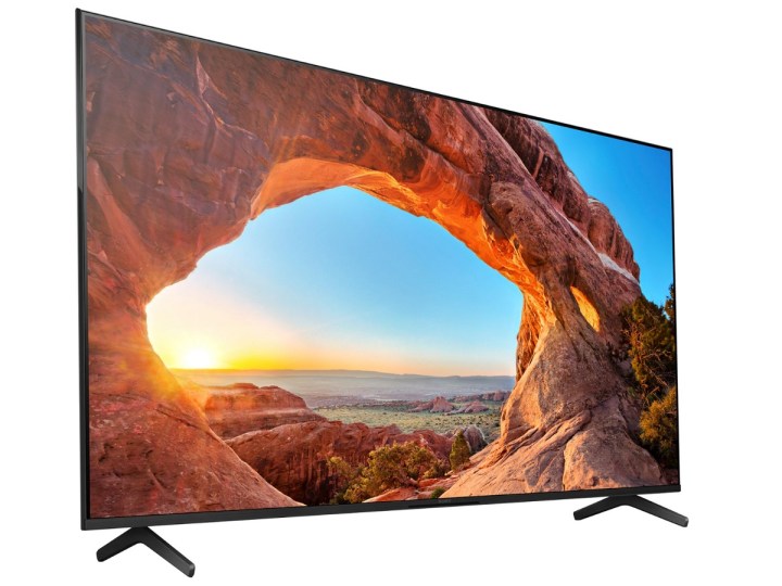 The 65-inch Sony X85J Series 4K TV with a nature landscape on the screen.