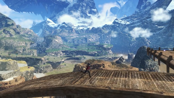 A man in a red jacket running by a vista in Xenoblade Chronicles 3.