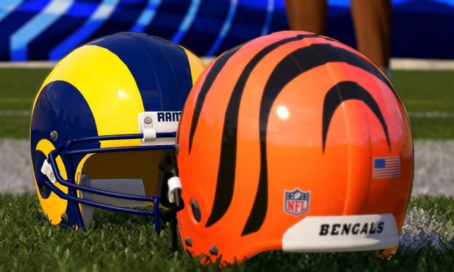 A Rams and bengals helmet sit on the field in Madden 22.