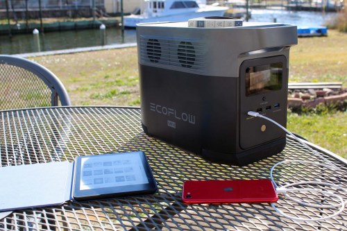 EcoFlow Delta Mini outside with devices connected.
