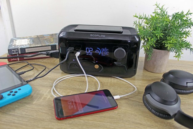 EcoFlow RIVER Mini charging devices on a desk.