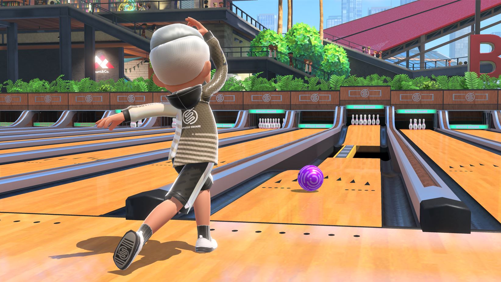 O jogador joga uma bola de boliche no Nintendo Switch Sports.