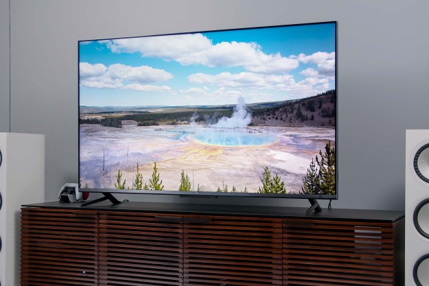 An image of Yellowstone National Park is seen on the TCL 6-series Google TV's display.