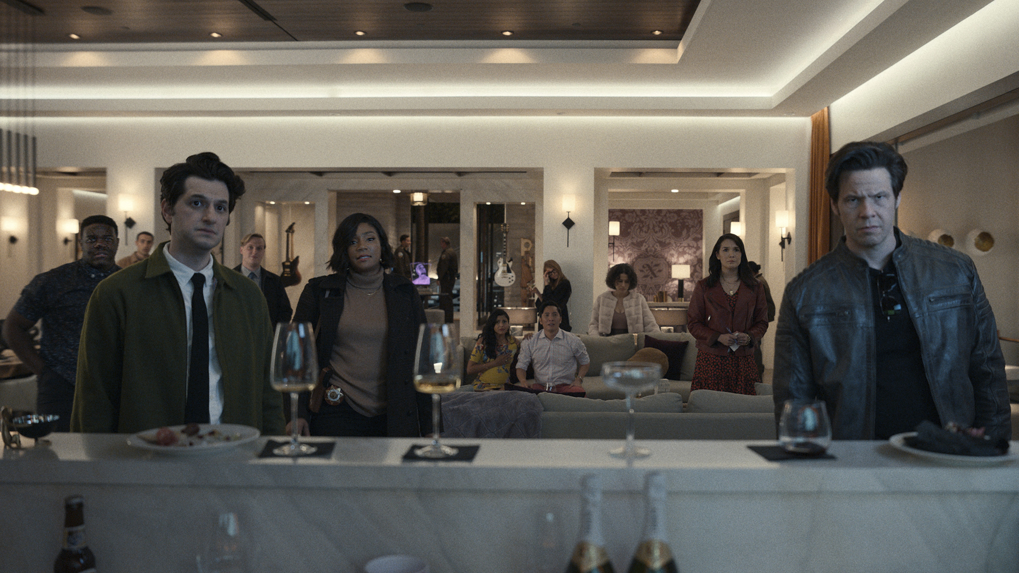 The main characters in the house looking forward in Apple TV+'s The Afterparty.