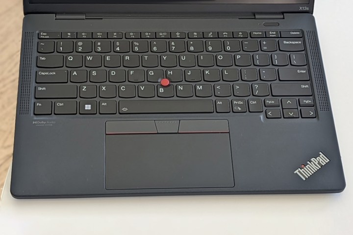Gray keyboard with red accents on the ThinkPad x13s.