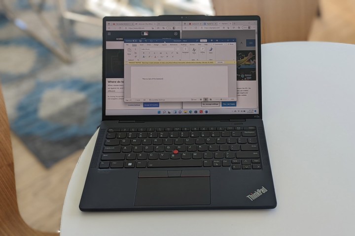 Directly on the image of the ThinkPad x13s.