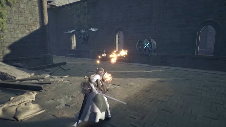 Valkyrie shooting fireballs at a flying enemy in Valkyrie Elysium.