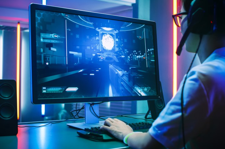 Person using a gaming monitor.