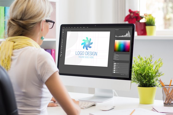 A graphic designer using an image editing program.