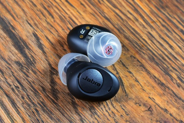 The Jabra Enhance Plus earbuds snap together magnetically.