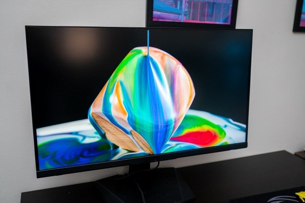 Paint pouring over a cube on the MSI Optix MPG 32 QD.