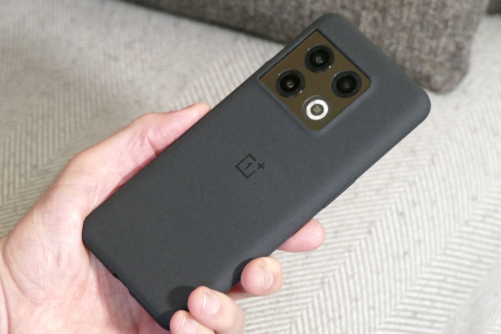 OnePlus 10 Pro in its Sandstone case.