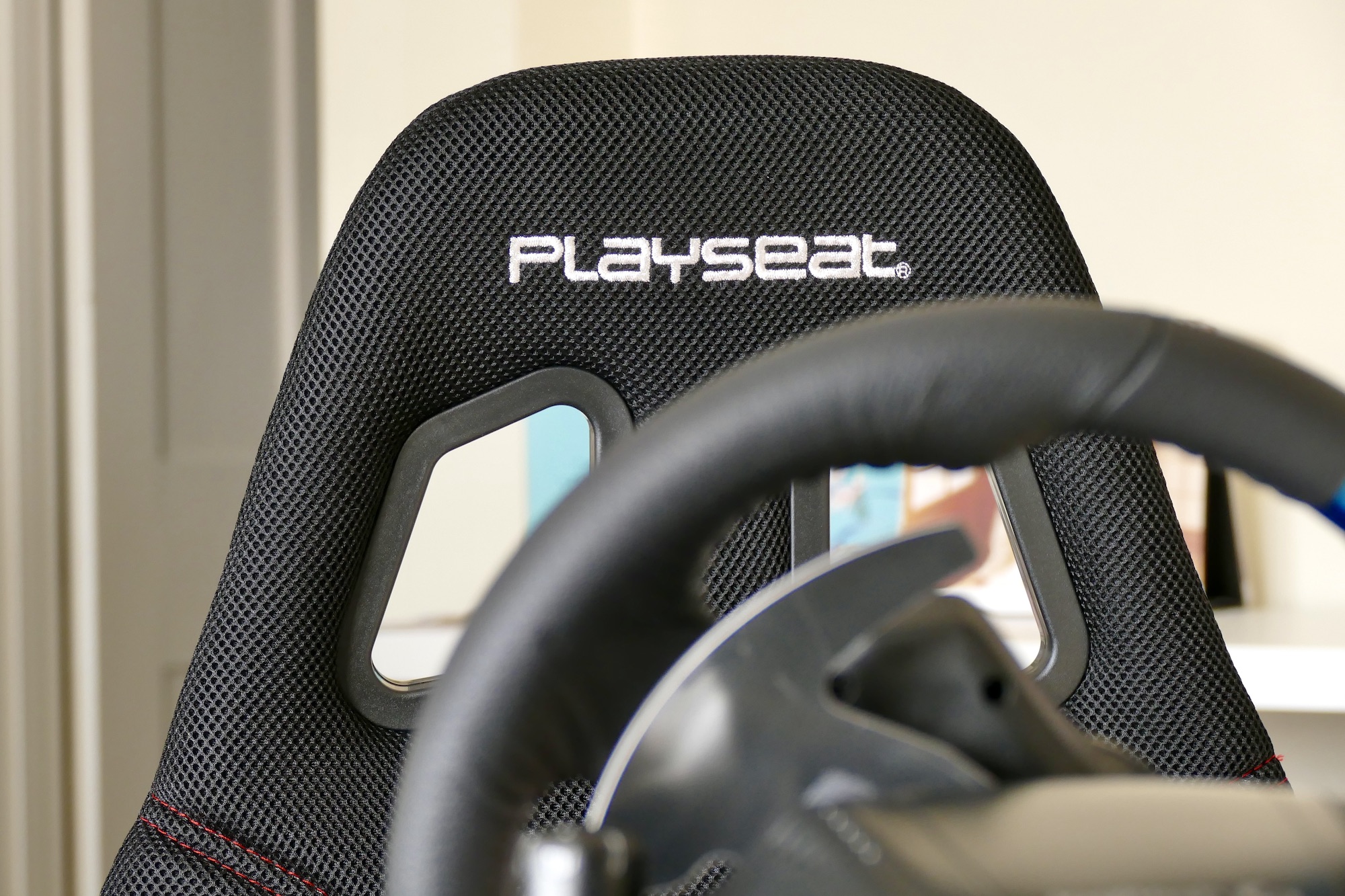 PlaySeat Challenge logo on the seat back.