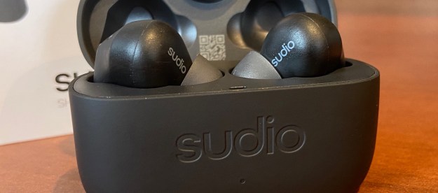 Sudio E2 wireless earbuds in their charging case.