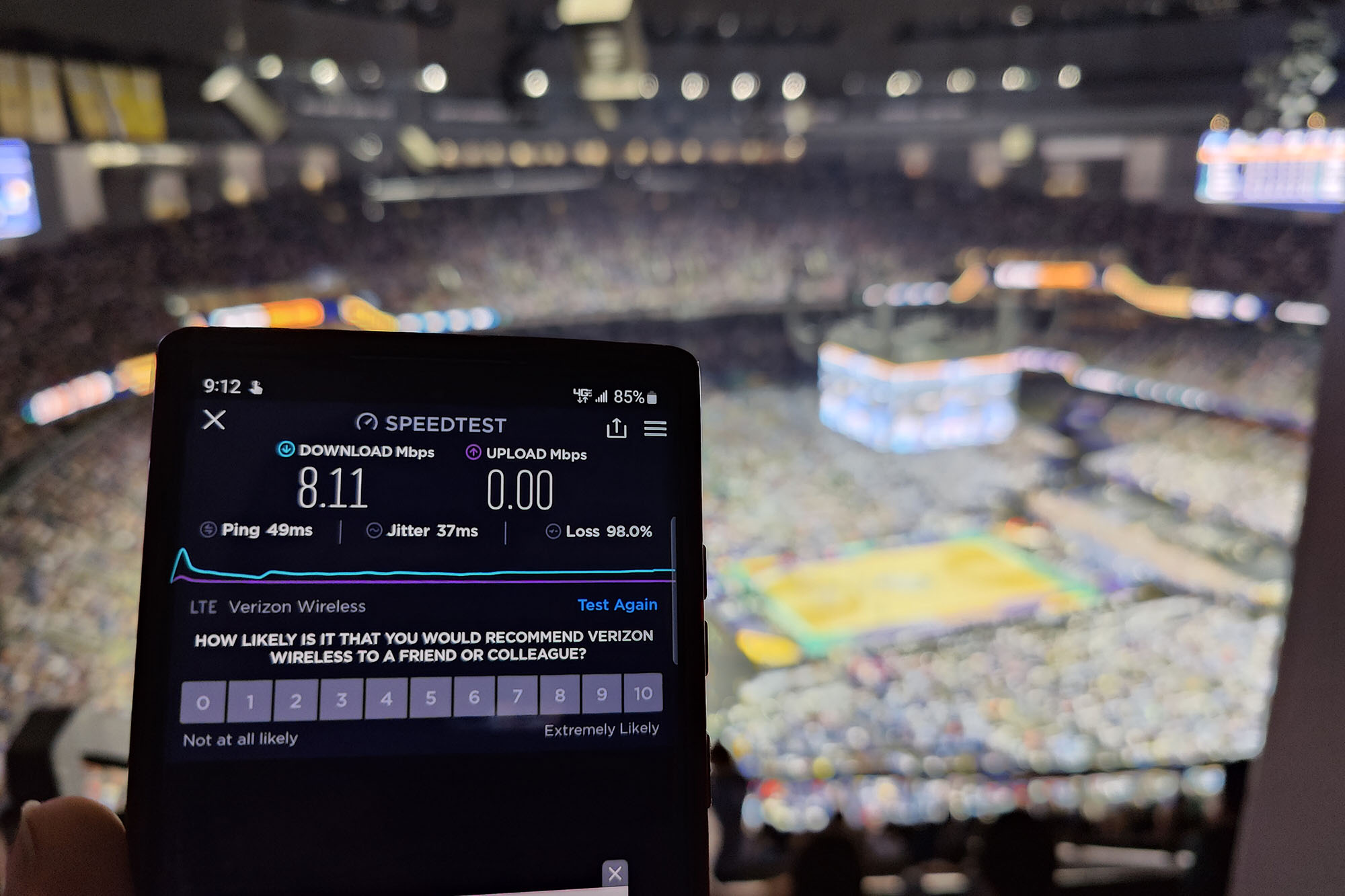 5G test with a basketball game in the background.
