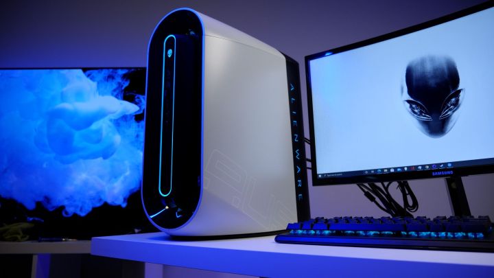 Alienware R12 gaming PC connected to a monitor on a desk.